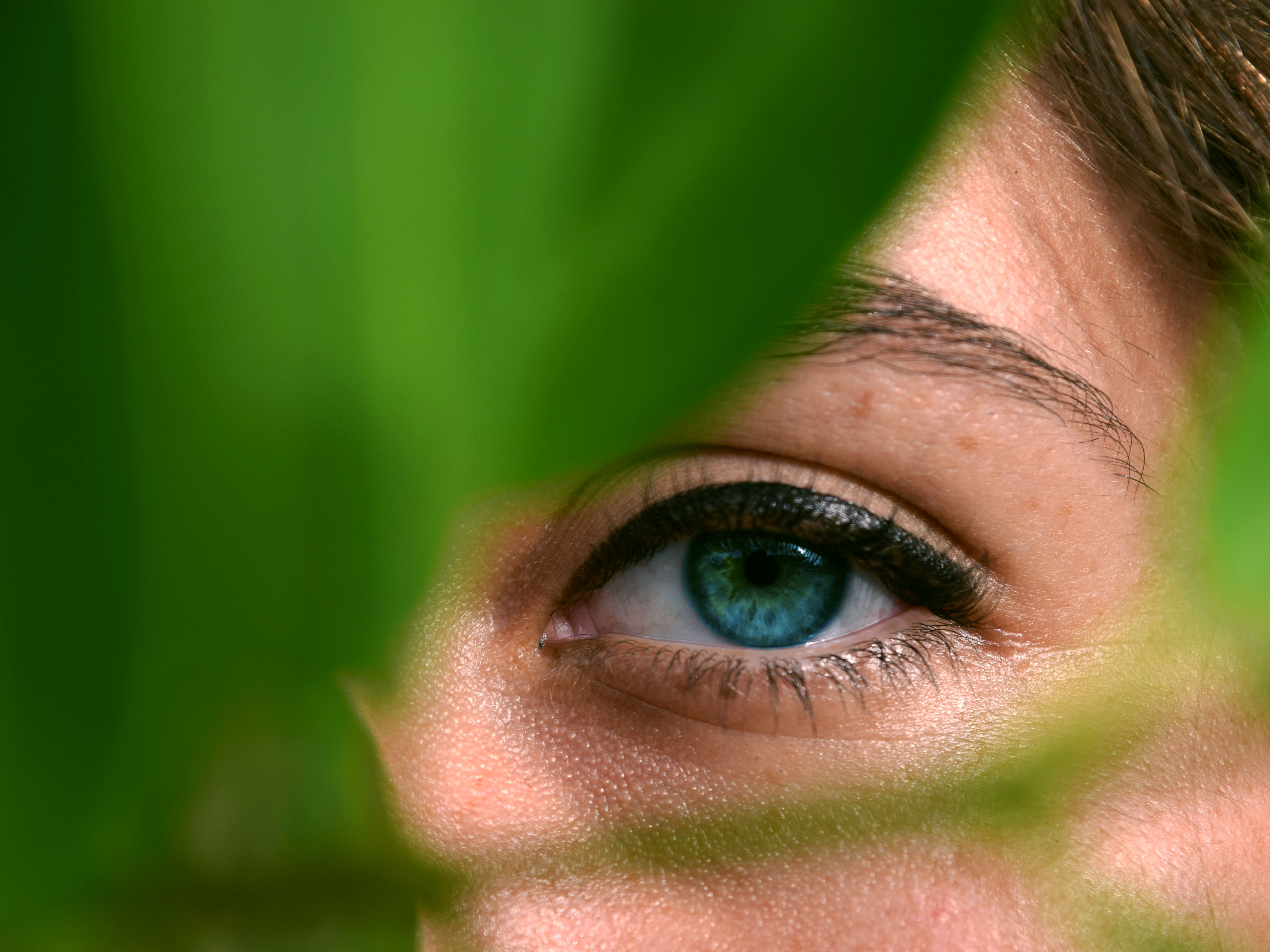 a photo of a woman's eye representing clarity